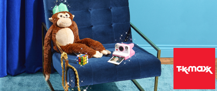 plush monkey on a chair
